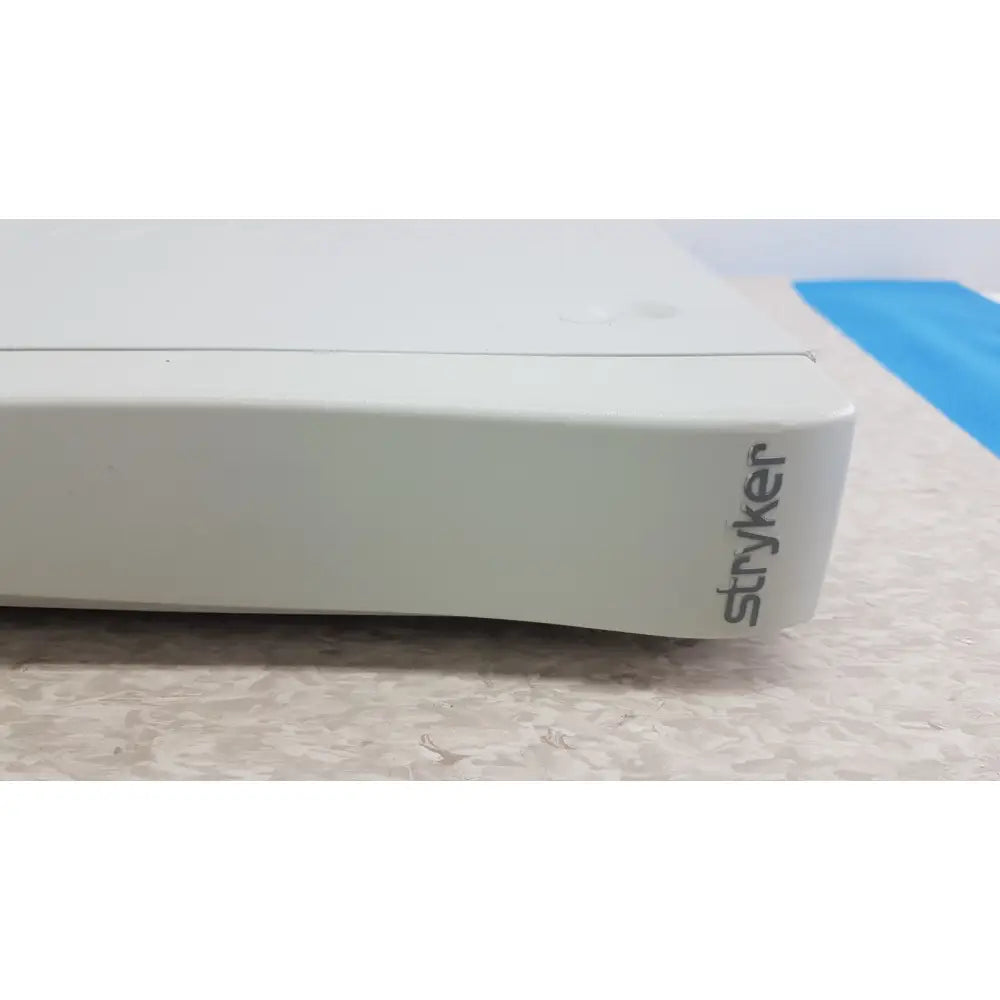 White stryker suiteStream HD medical video integration box with sleek minimalist design for surgical streaming systems