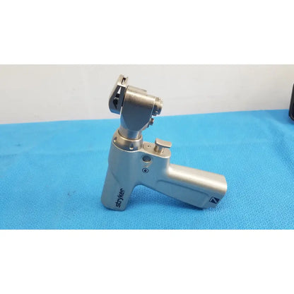Stryker system 7 sagittal saw handpiece with metallic ergonomic handle and articulated head for reuse medical orthopedic instruments