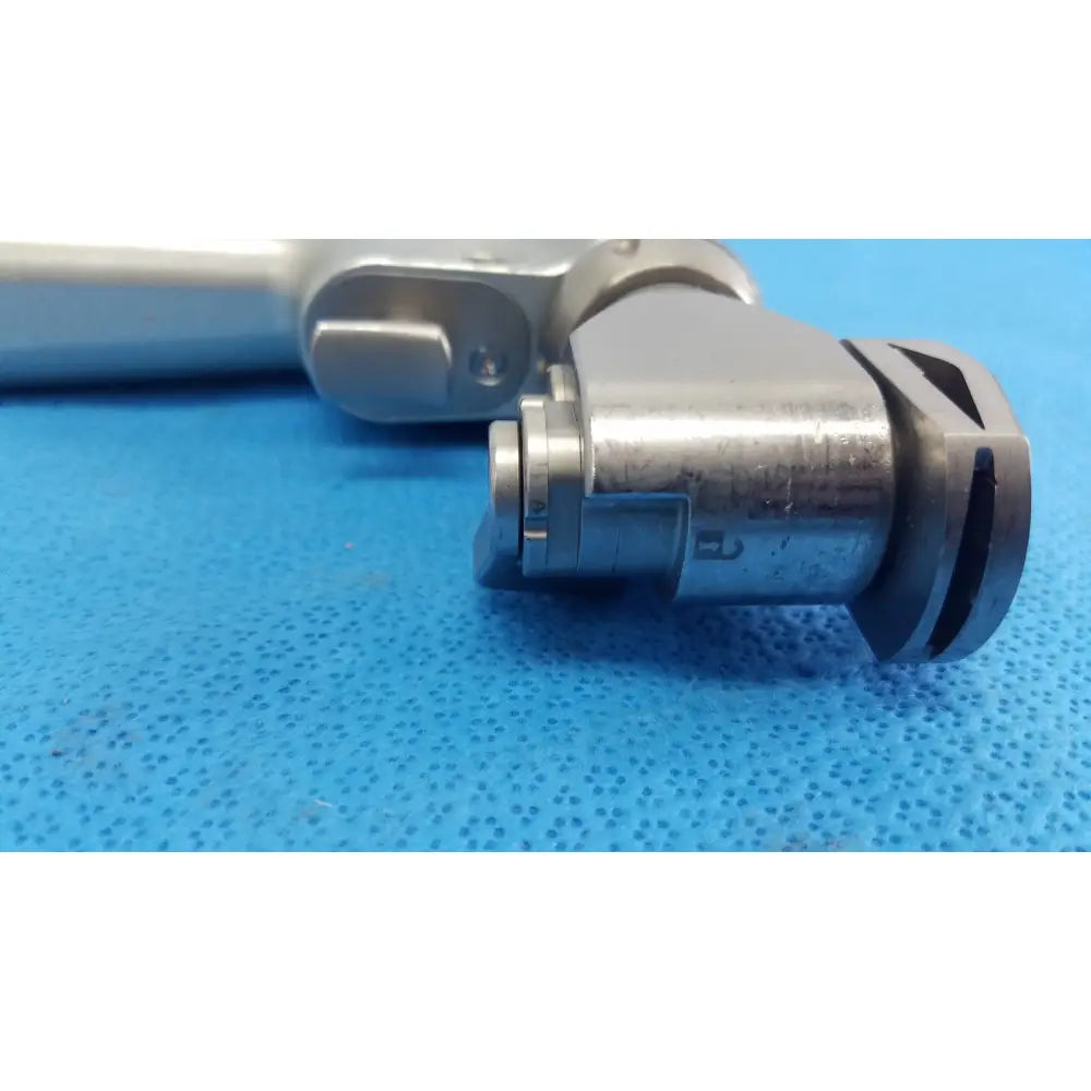 Stryker system 7 sagittal saw handpiece 7208-000-000 silver orthopedic instrument with polished metal reuse medical design
