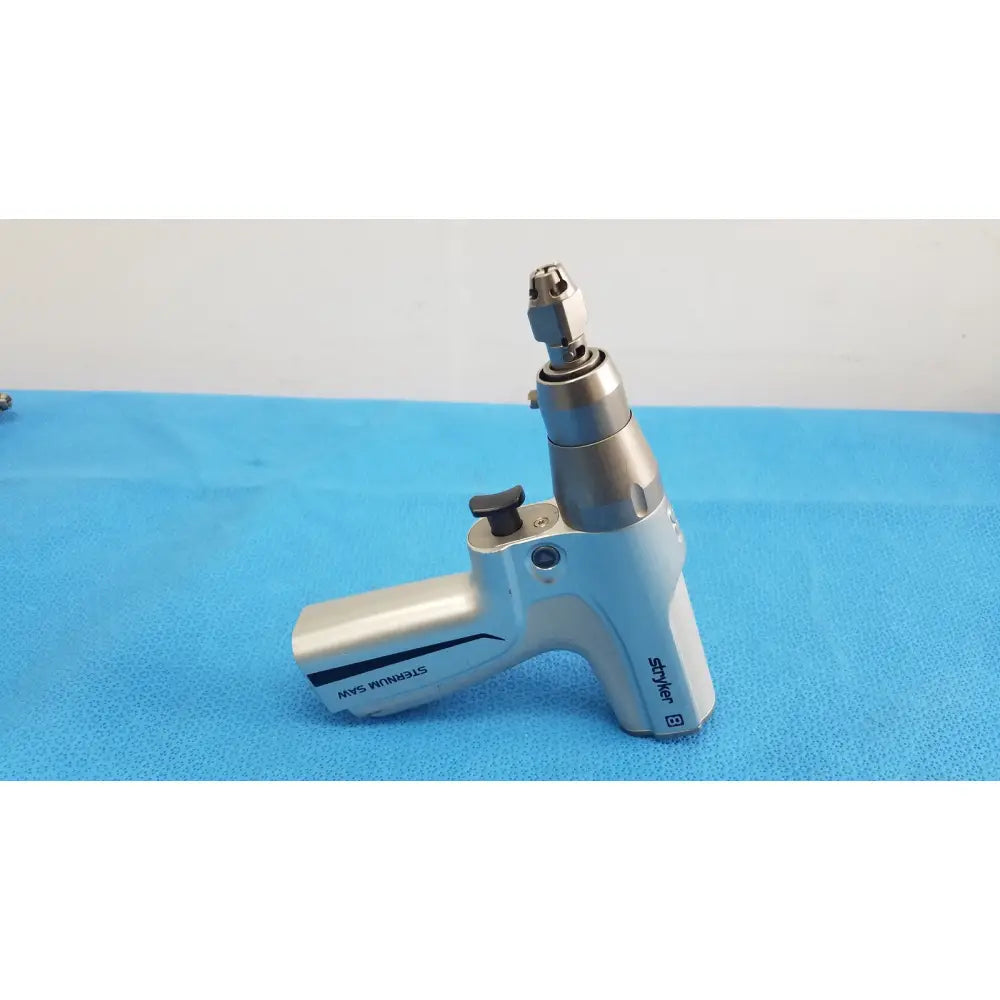 Stryker system 8 sternum saw 8207-000-000 surgical drill in silver and black with textured grip for reuse medical orthopedic instruments