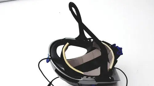 Stryker t5 surgical helmet in black with glossy finish and adjustable blue-accented straps for reuse medical settings