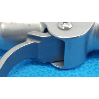Silver-colored metal trigger with polished finish and ergonomic design for stryker wire collet 4100-062-000 wire collet