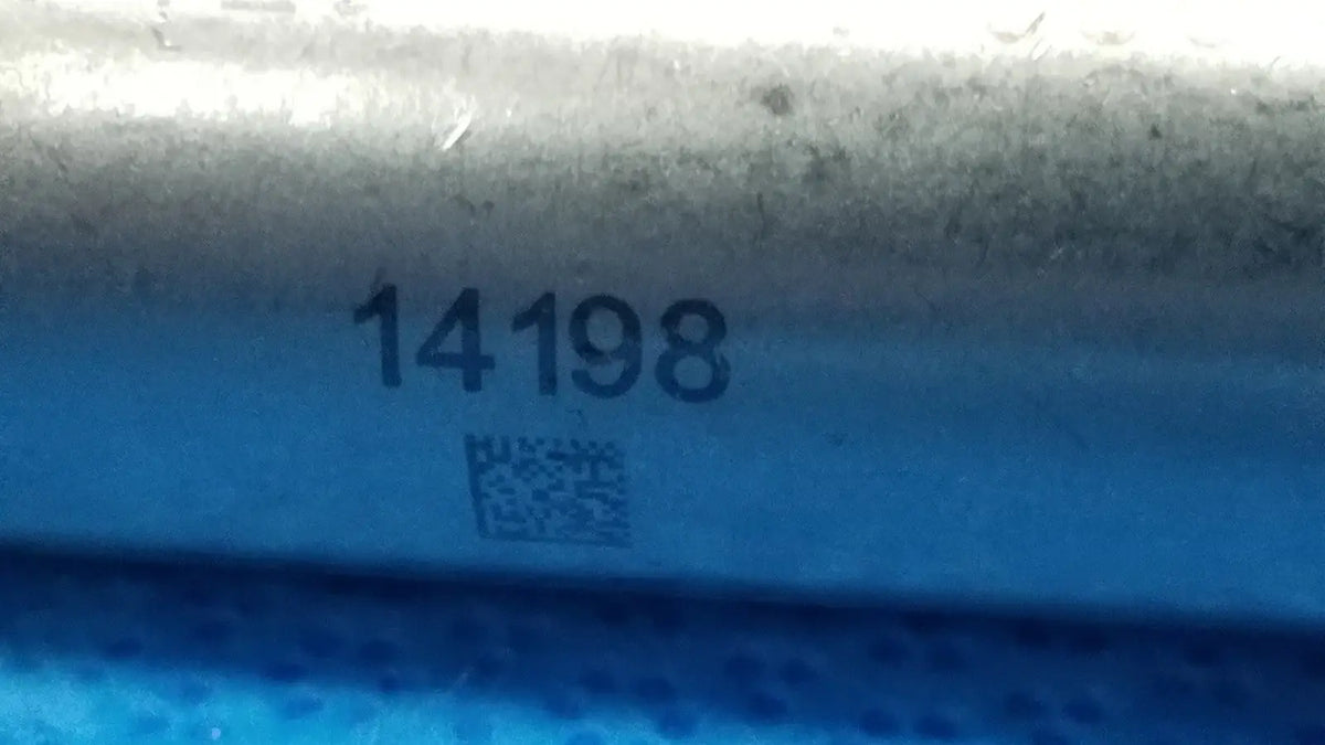 Blue cylindrical metallic stryker wire collet 4100-062-000 with printed numbers and qr code for reuse medical use