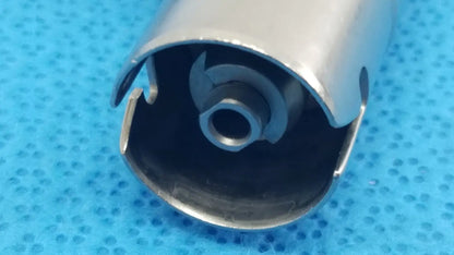 Silver metallic cylindrical stryker wire collet 4100-062-000 with central threaded hole and flanged ends for industrial use