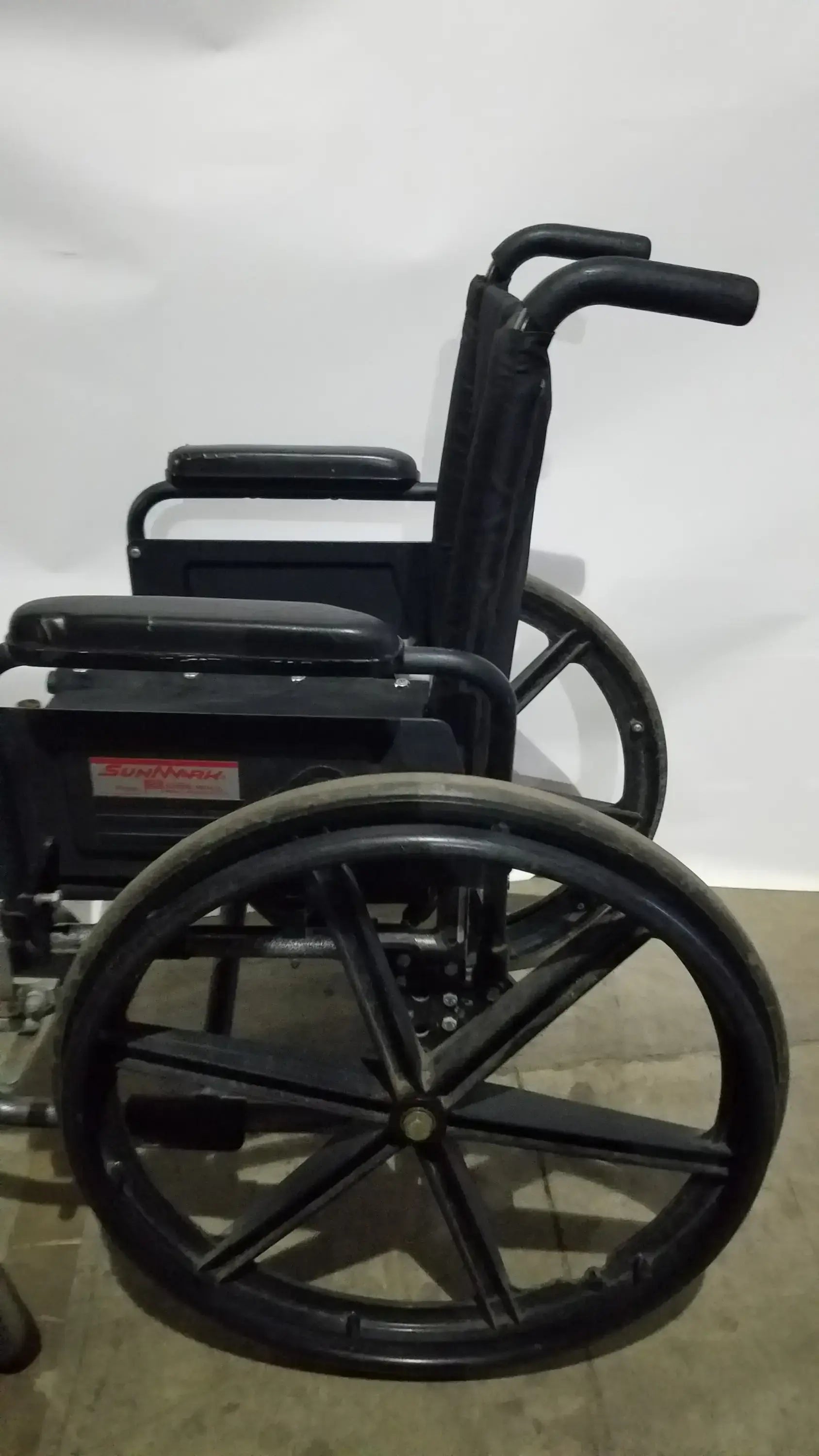 Reuse Medical Equipment Sunmark Folding Manual Wheelchair - Durable Black Padded Comfort Seat Manual Wheelchair, second-hand product photo 9