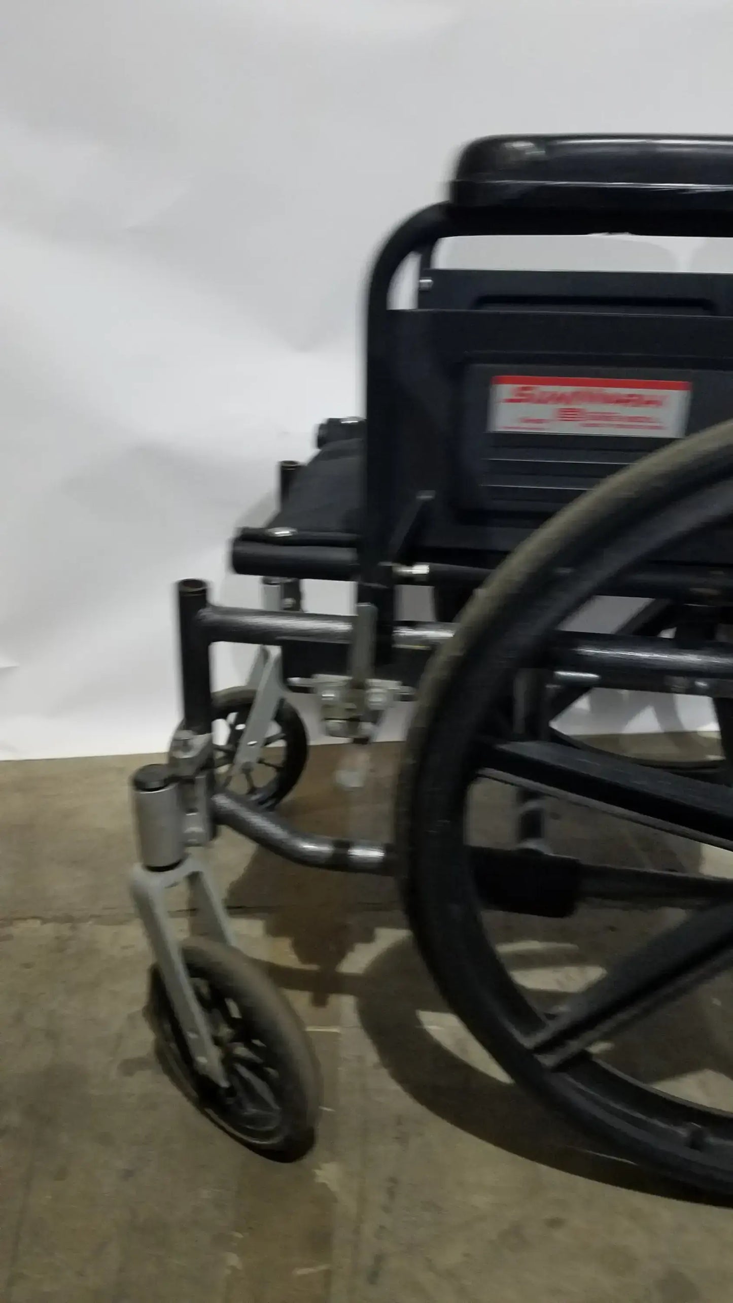 Reuse Medical Equipment Sunmark Folding Manual Wheelchair - Durable Black Padded Comfort Seat Manual Wheelchair, second-hand product photo 11