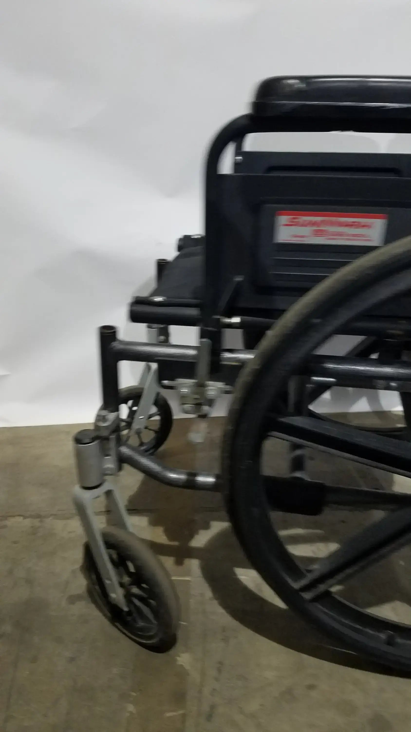 Reuse Medical Equipment Sunmark Folding Manual Wheelchair - Durable Black Padded Comfort Seat Manual Wheelchair, second-hand product photo 11