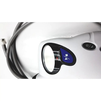 White suntech handheld uv light with black and blue sun moon control panel for ambulatory blood pressure use