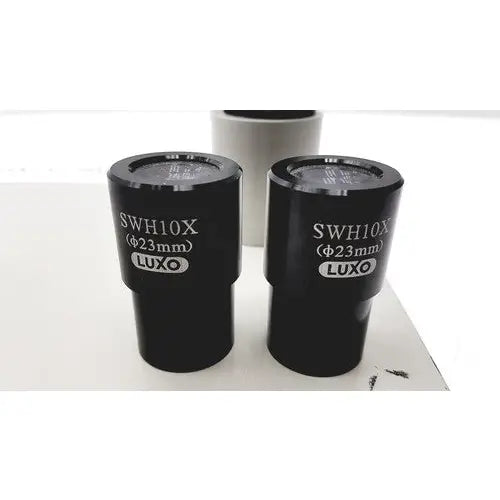 Black cylindrical super widefield microscope eyepieces 23mm swh10x with luxo engraving on their surfaces