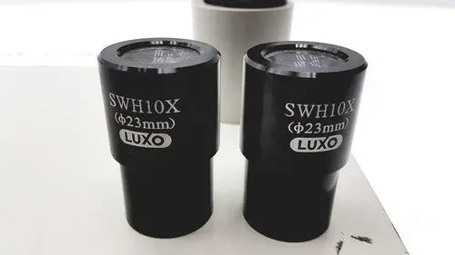 Black cylindrical super widefield microscope eyepieces 23mm swh10x with luxo engraving on their surfaces