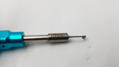 Blue-handled dental instrument with metallic shaft and fine needle probe designed as a compatible dental instrument tool