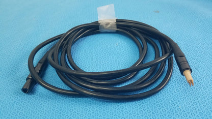 Black coiled surgical scher handpiece cable console power cord with black and beige connectors for medical equipment reuse