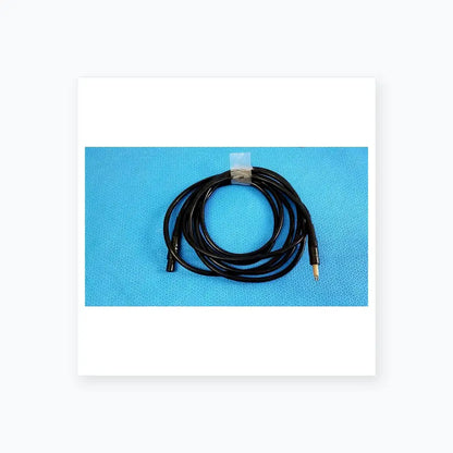 Black coiled surgical scher handpiece cable console connector power cord with black and gold-toned connectors for medical equipment