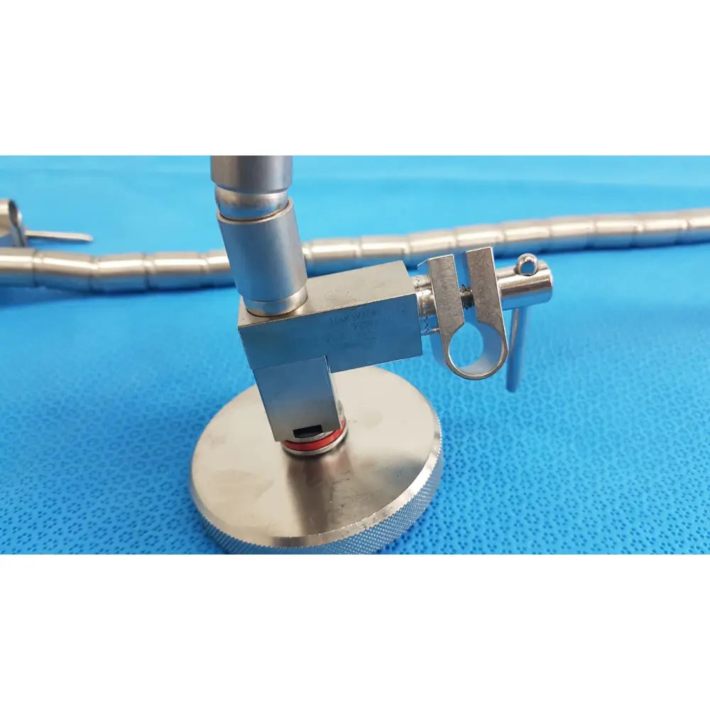 Stainless steel surgical snake flexarm with circular base and articulated arm for endoscope holder in operating room
