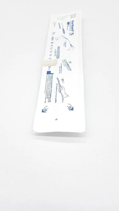White plastic-wrapped sterile vac-guard catheter kit with blue printed instructions in surgimark via-guard suction set smk box