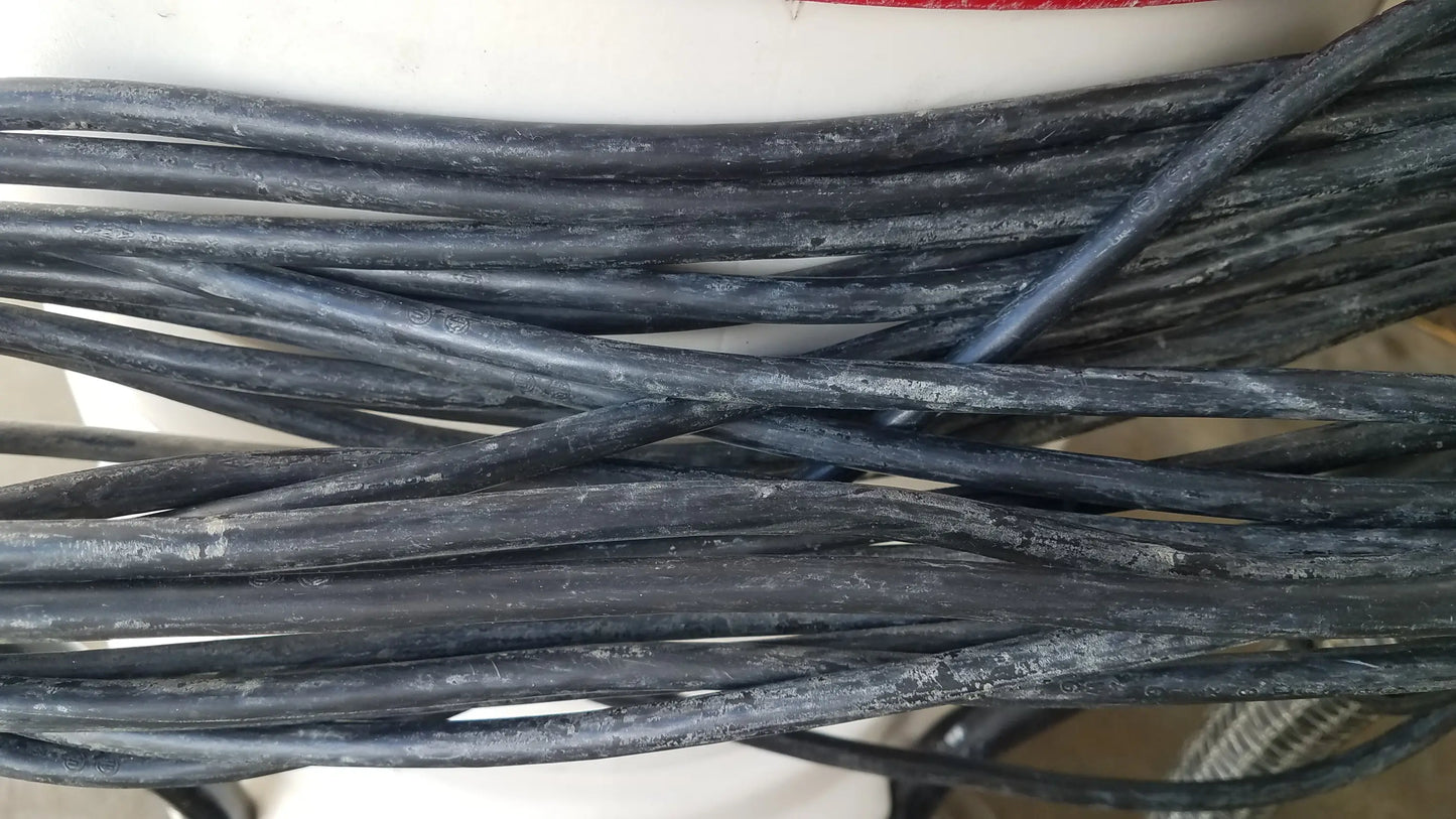 Coiled black electrical cables with a matte finish for surtec system c72f1 wet dry vacuum cleaner 115v s n 2449