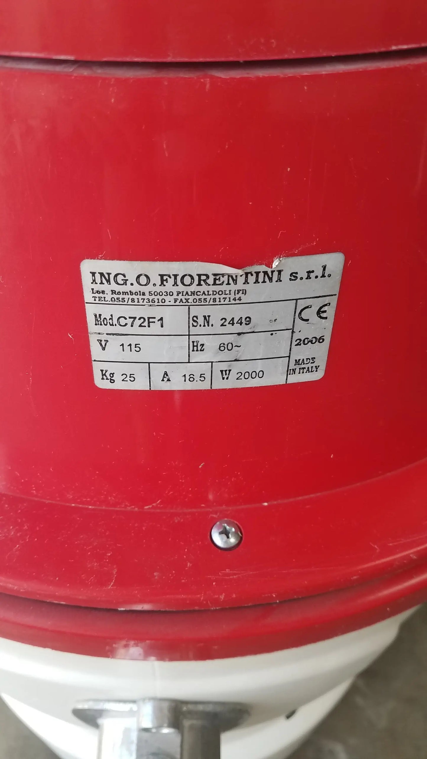 Red cylindrical wet dry vacuum fan with white base and metallic parts featuring engraved c72f1 model label