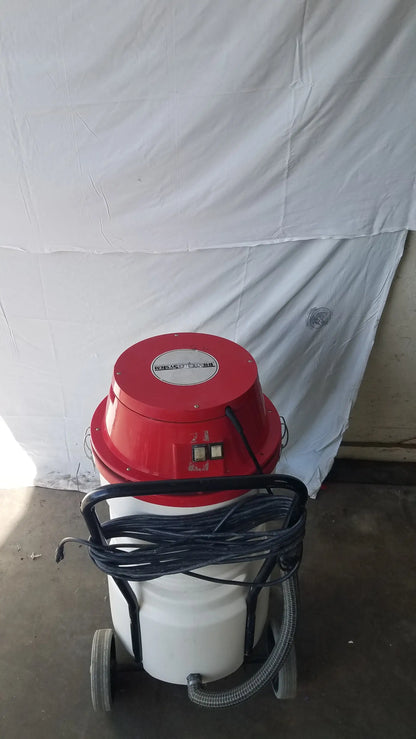 Surtec system c72f1 red and white wet dry vacuum cleaner with black hose coiled around handle for versatile use