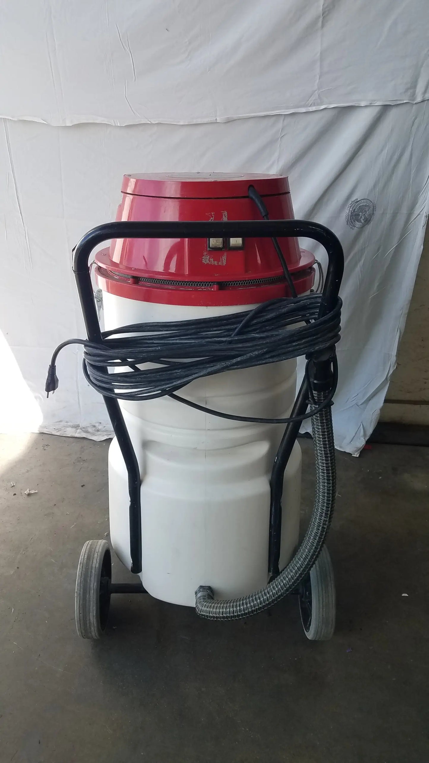 Surtec system C72F1 wet dry vacuum cleaner 115V with red and white body black handle hose and wheels for dry vacuum use