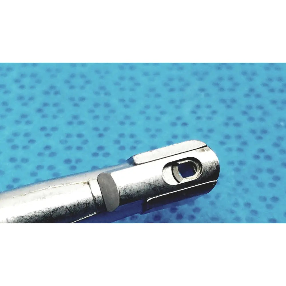 Silver-colored metal pen tip with oval attachment hole on sybronendo 18:1 axxess spring-head handpiece model 815-9016