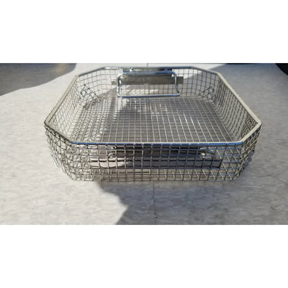 Silver wire mesh basket with sturdy metal handle in the symmetry medical flashpak 9020 sterilization container system
