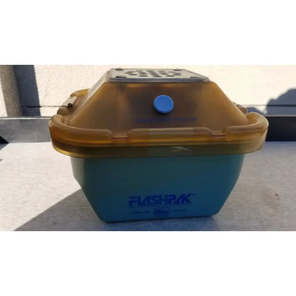 Symmetry Medical FlashPak 9020 blue and amber plastic sterilization container with translucent lid and blue button