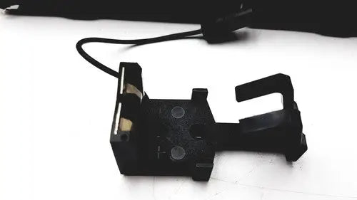 Black plastic phone mount with curved hook and rectangular base for reuse medical use synectics digitrapper 4mb