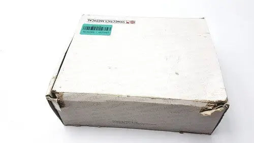 White cardboard box of synectics digitrapper 4mb with green barcode sticker and synthetic medical label for reuse medical use