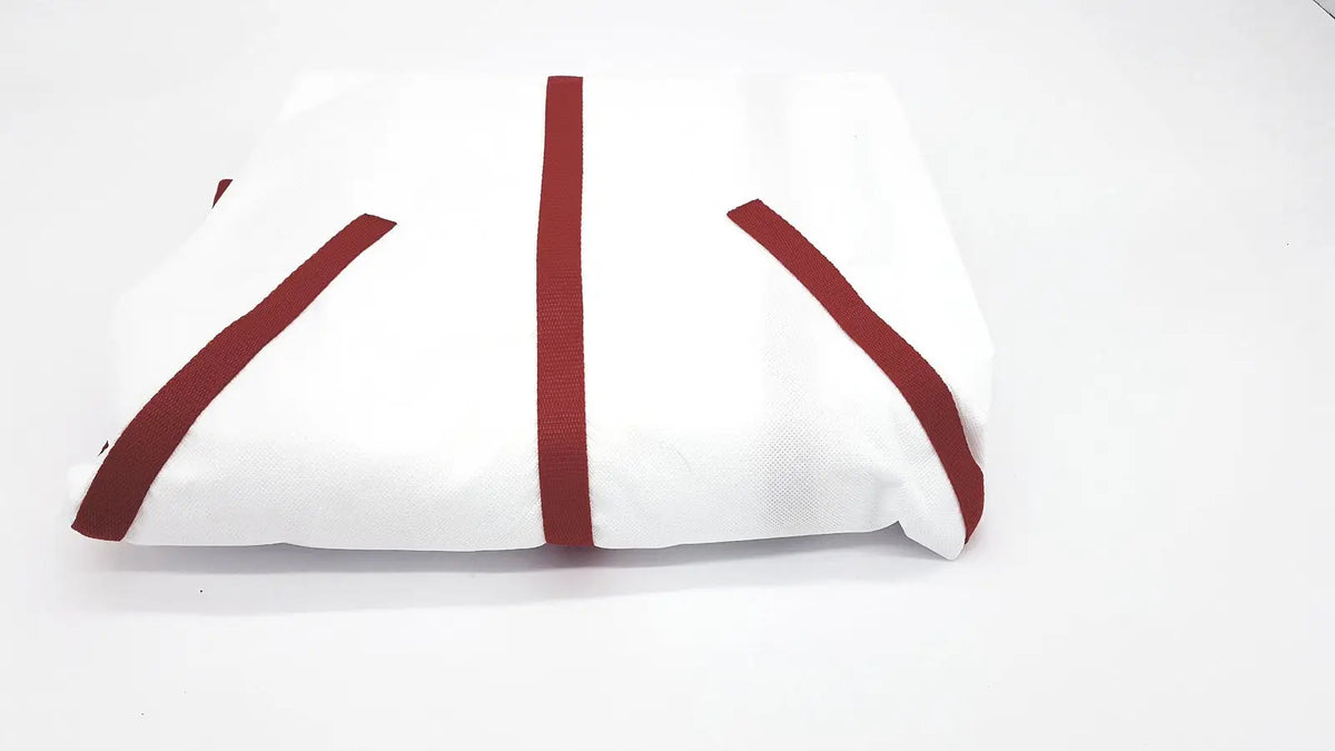 White fabric romedic high back sling with bold red diagonal stripes designed for reuse medical lifting slings