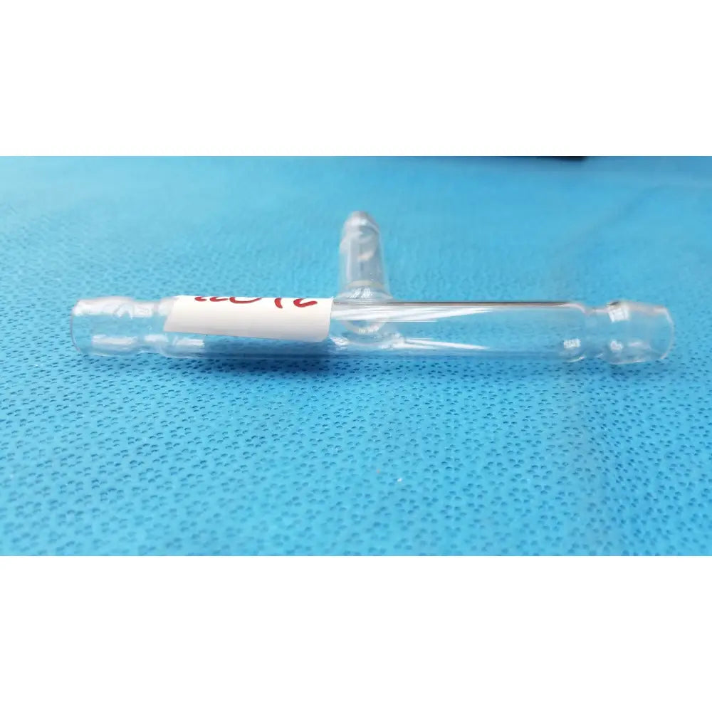 Clear glass vial with white label and red text featuring sealed ends and cap in t-shaped hose connector tube 71mm labware