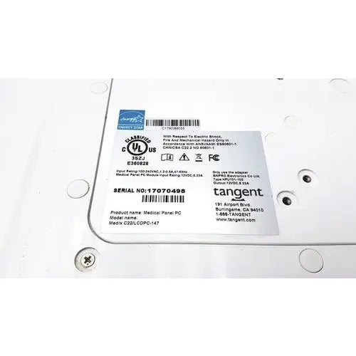 White rectangular label on the back of tangent medical panel pc model c22 lcdpc 147 showing serial number and product details