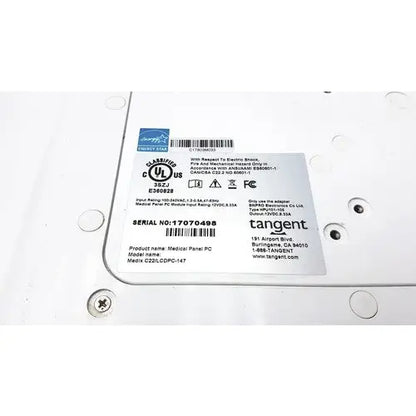 White rectangular label on the back of tangent medical panel pc model c22 lcdpc 147 showing serial number and product details
