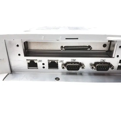 Silver metallic industrial chassis of tangent medical panel pc model c22 with lan1 lan2 and com1 com2 ports backside view