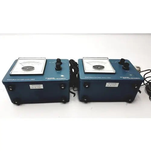 Blue teledyne portable oxygen analyzers with black knobs and coiled cords as portable oxygen analyzer devices