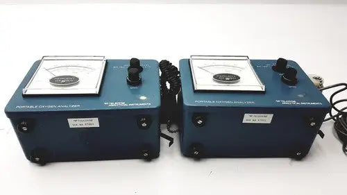 Blue teledyne portable oxygen analyzers with black knobs and coiled cords as portable oxygen analyzer devices