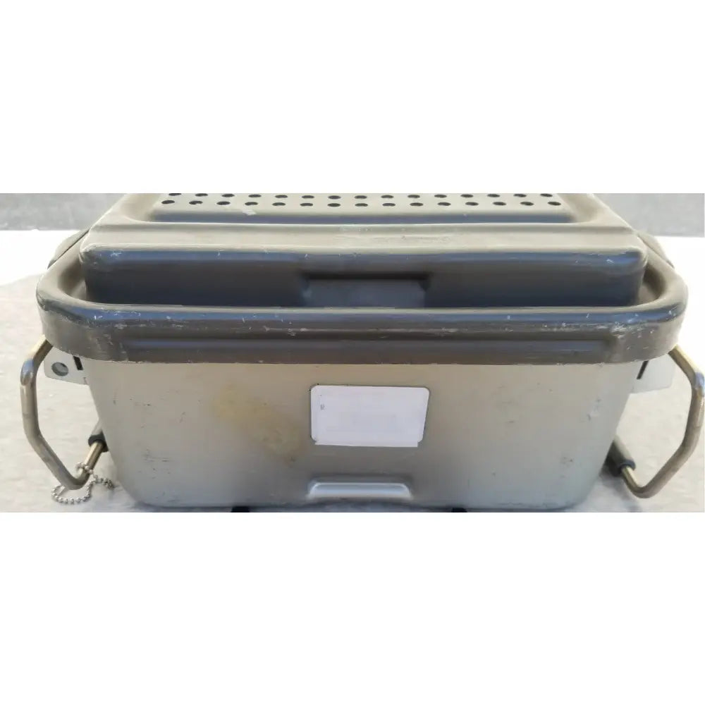 Gray plastic case genesis sterilization container with perforated lid and metal handles for medical use