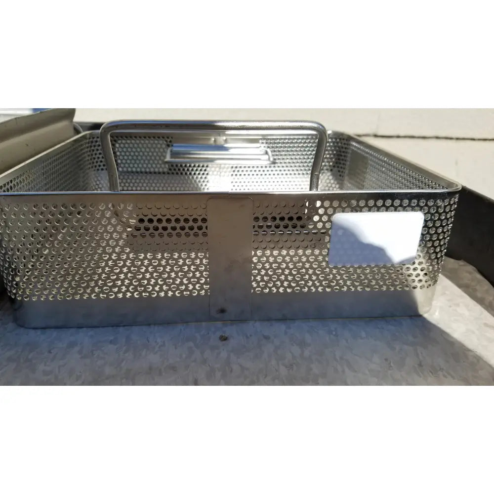 Stainless steel perforated basket with sturdy handle and reinforced base for case genesis sterilization container