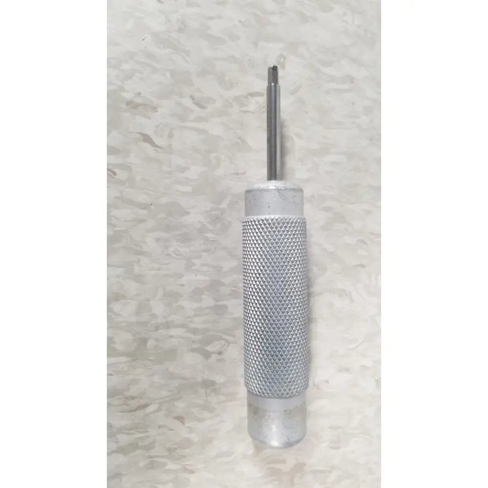 The case genuis serial no 9354 is a silver metallic tool with a textured grip and slender pointed tip patent pending