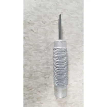 The case genuis serial no 9354 is a silver metallic tool with a textured grip and slender pointed tip patent pending