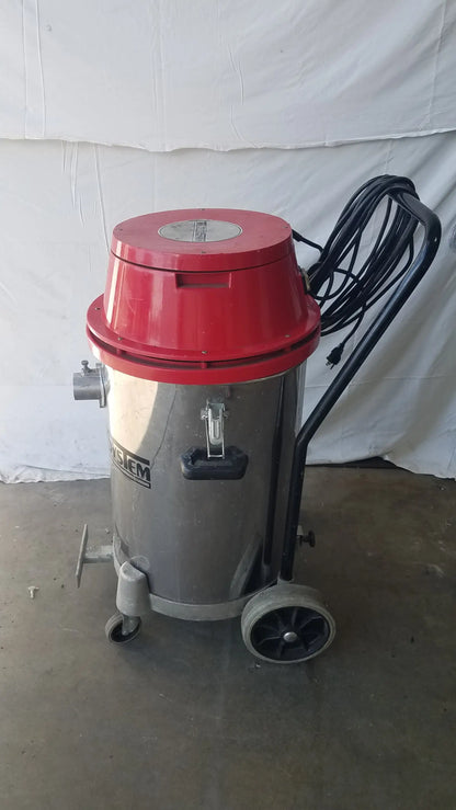 The surtec system 450m industrial red and silver wet dry drum vacuum cleaner with black handle and coiled hose