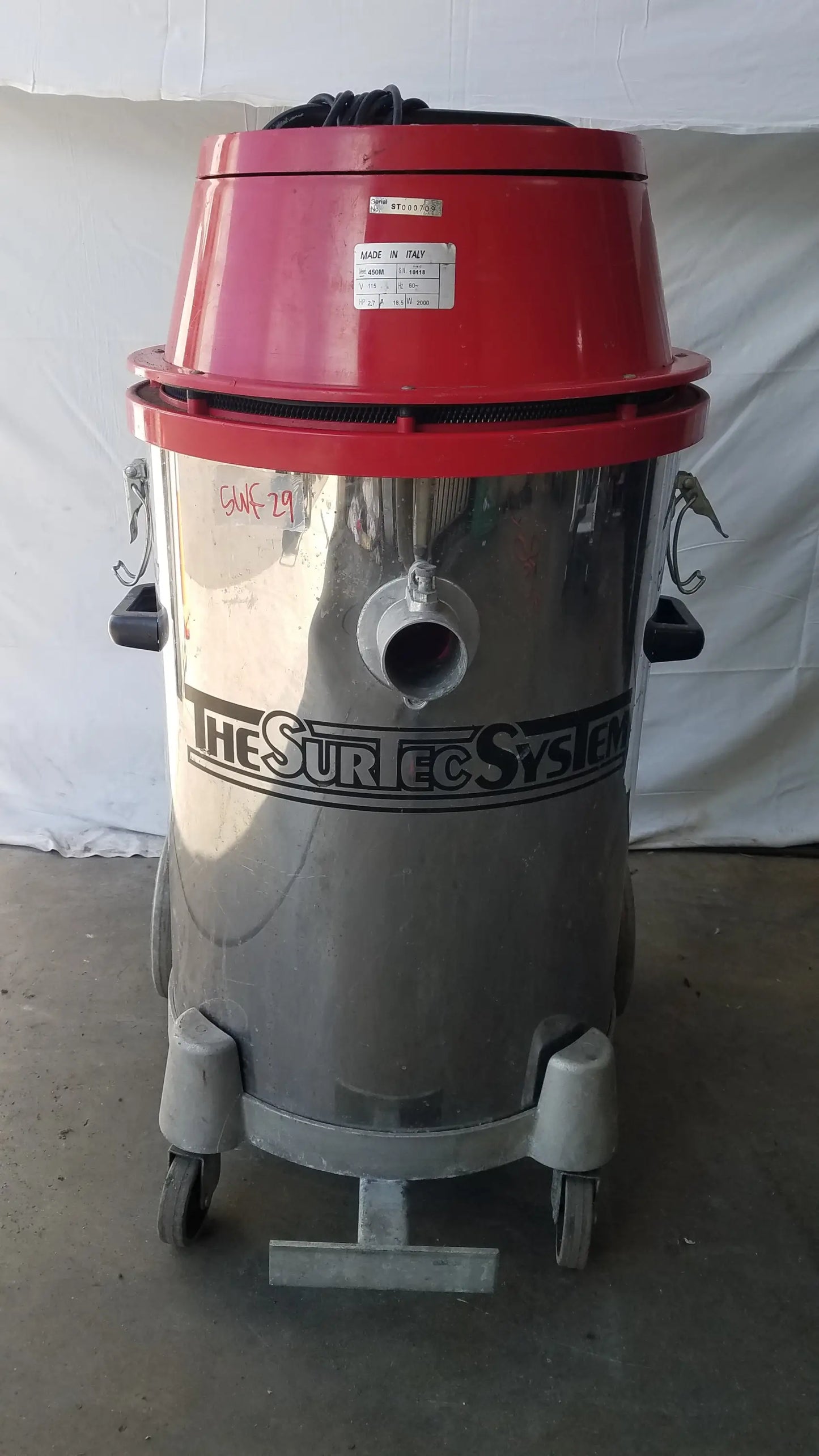 Red and silver The Surtec System 450M wet dry drum vacuum cleaner with industrial heavy duty wet dry use features