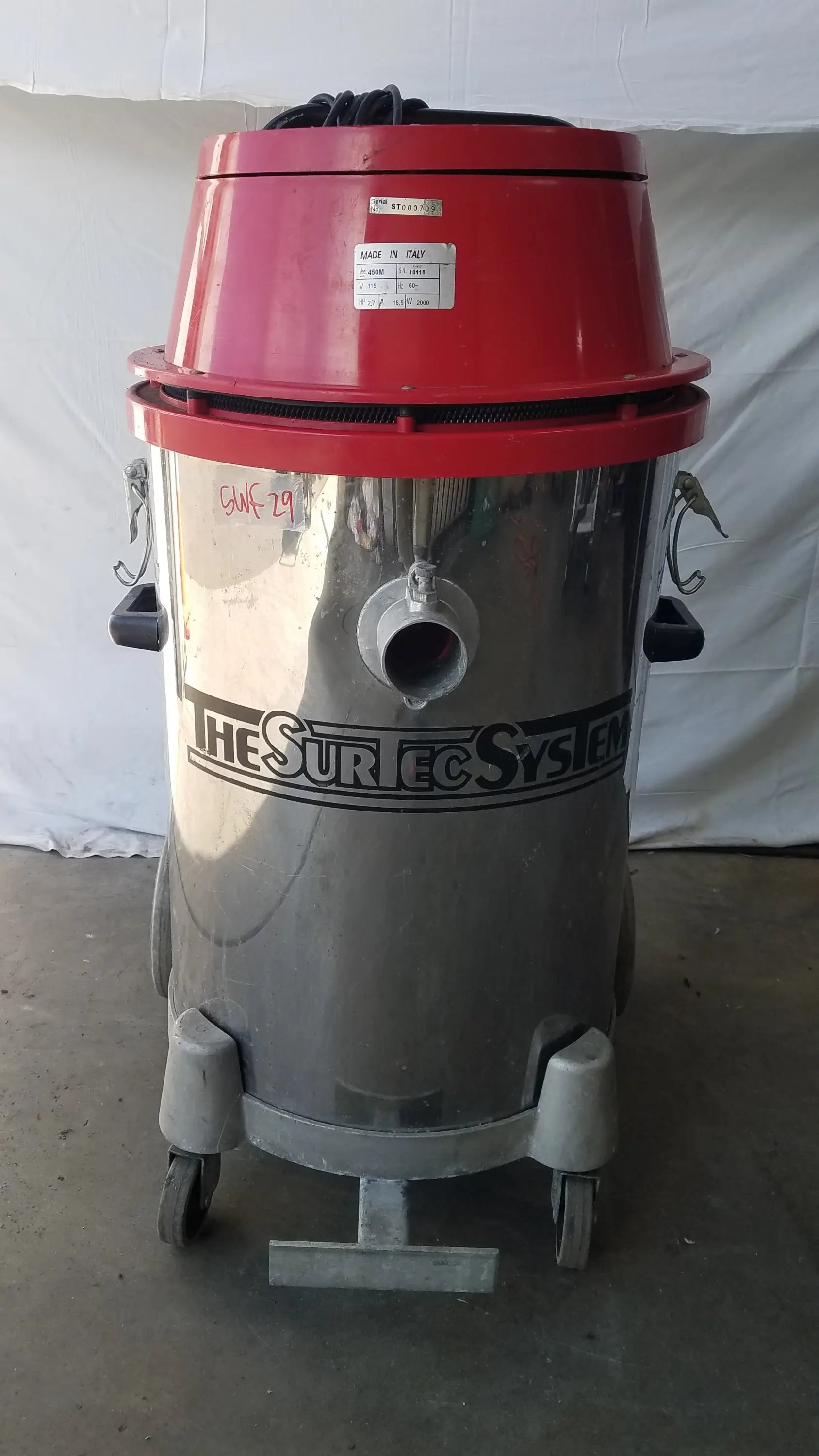 Red and silver The Surtec System 450M wet dry drum vacuum cleaner with industrial heavy duty wet dry use features