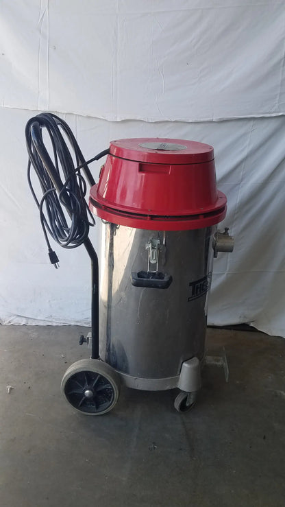 The Surtec System 450M wet dry drum vacuum cleaner is a red and silver industrial vacuum with black handle and wheels