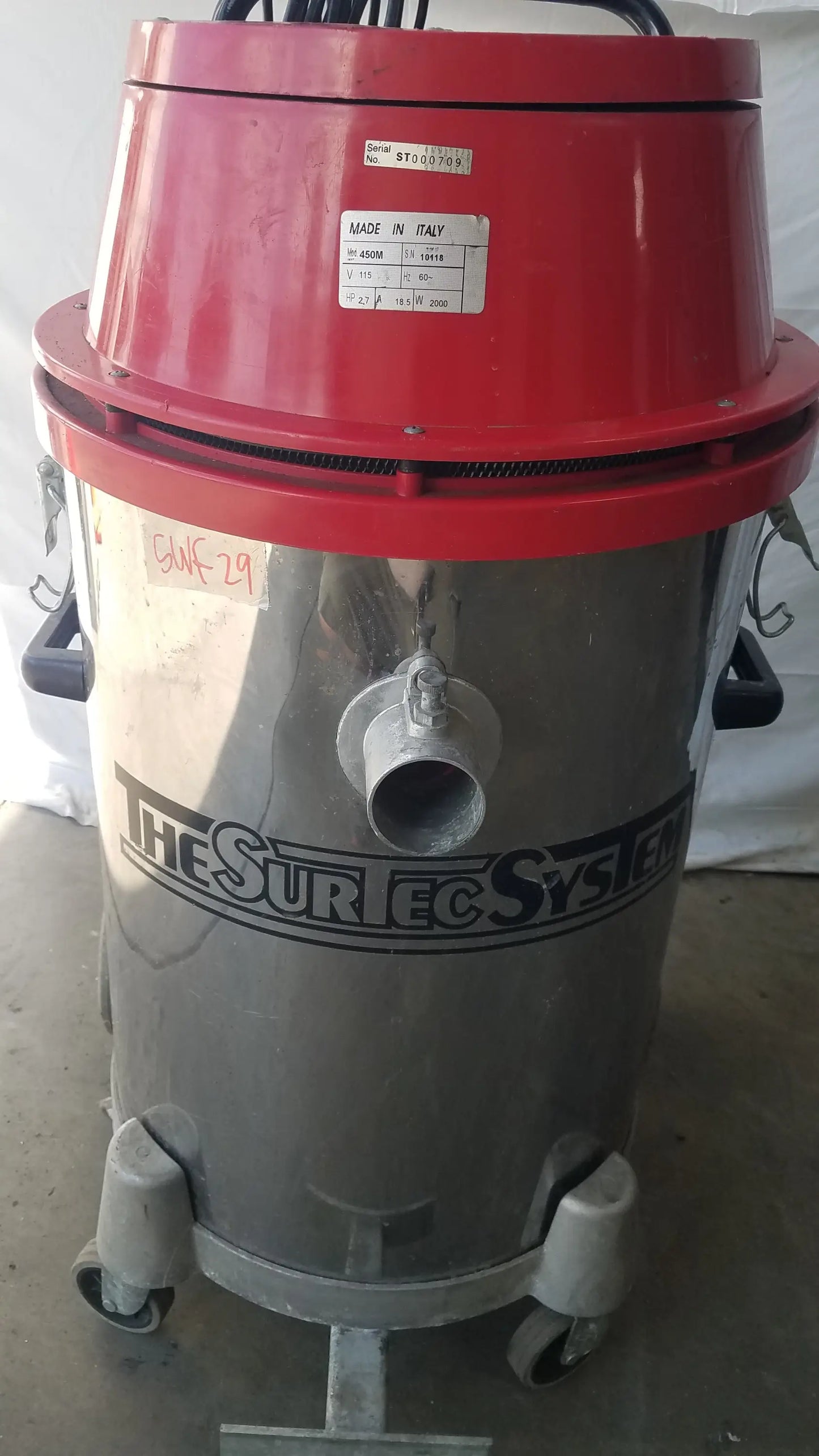 Red and silver industrial heavy duty wet dry drum vacuum cleaner with the surtec system branding on its cylindrical body