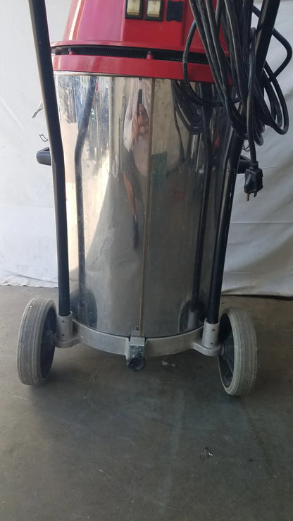 The surtec system 450m red and stainless steel wet dry drum vacuum cleaner with black hoses for industrial use