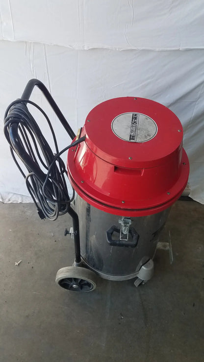 The Surtec System 450M industrial heavy duty red and gray wet dry drum vacuum with coiled hose and wheels