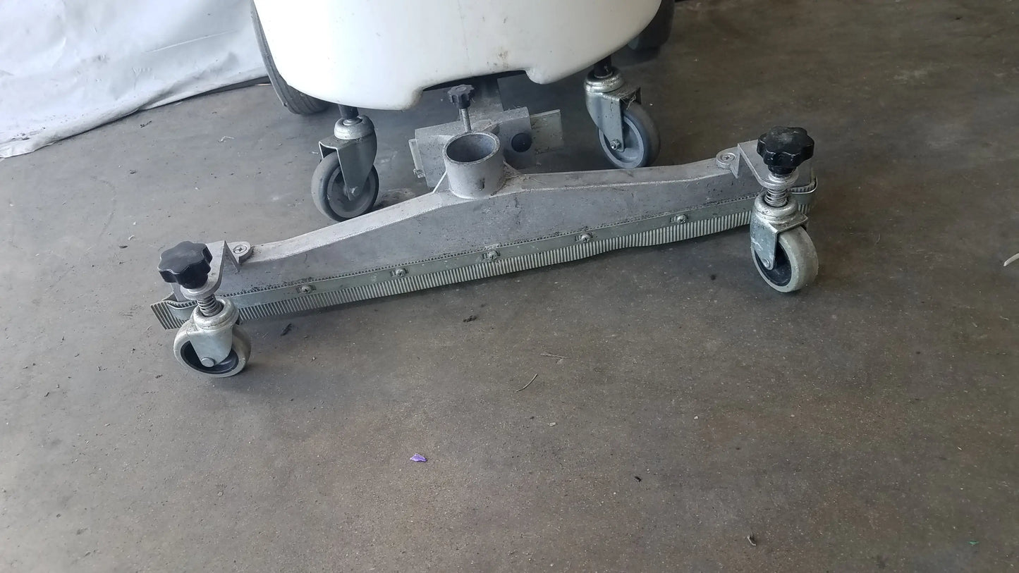 Metallic gray wheeled dolly with black adjustment knobs and central hole for surtec system c72f1 wet dry vacuum cleaner