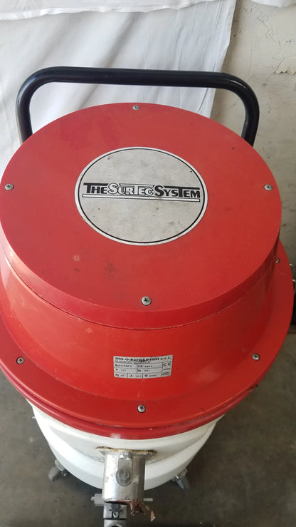 Red and white wet dry vacuum cleaner the sure system with black handle model surtec system c72f1 115v serial 2443
