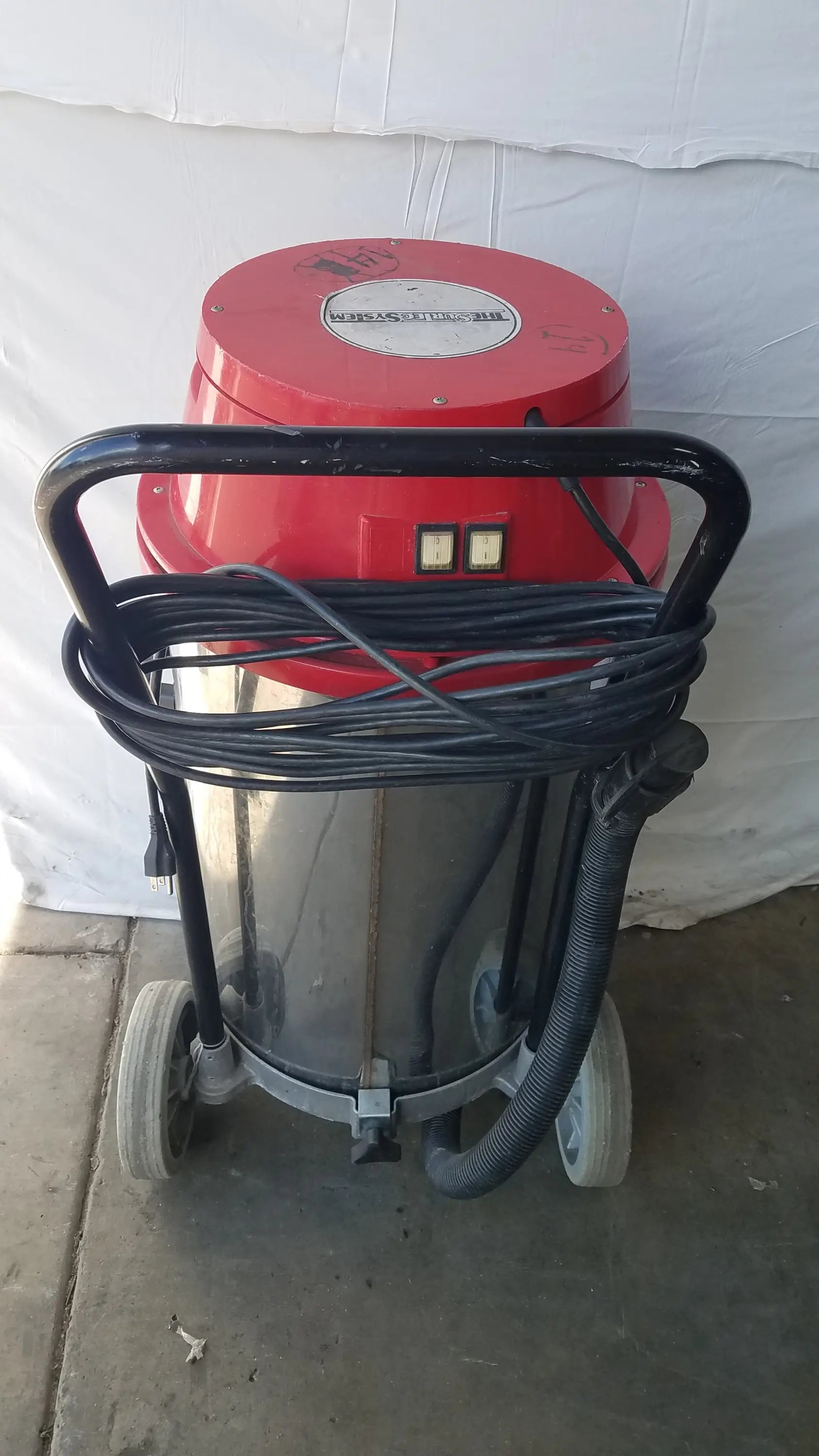 The surtec system f46f industrial heavy duty wet dry drum vacuum cleaner with red and silver body and black handle