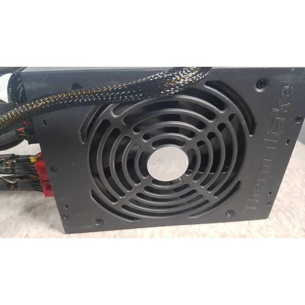 Black thermaltake 1350w toughpower gf3 full modular power supply with circular fan and braided cables